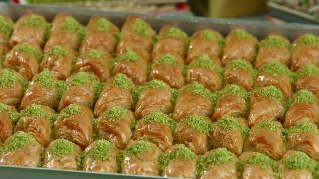 Traditional turkish baklava pistachio pastry. Dilberdudagi, ozel kesim baklava, cikolatali baklava, fistikli baklava, katmer, fistikli kadayif, kattafi, fistik sarma, soguk baklava, midye baklava, cev