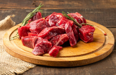 Juicy raw beef meat sliced for further cooking.