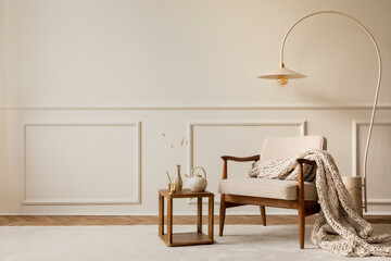 Warm and cozy living room interior with copy space, boucle armchair, stylish lamp, beige rug,...