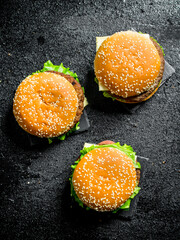 Burgers with vegetables and beef.