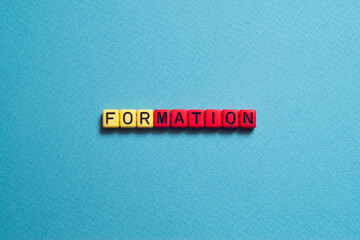 Formation - word concept on cubes, text