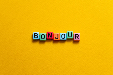 Bonjour - word concept on cubes © Яна Василевская