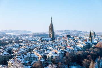 View of the city of Bern with a cathedral on a sunny winter day in Switzerland.