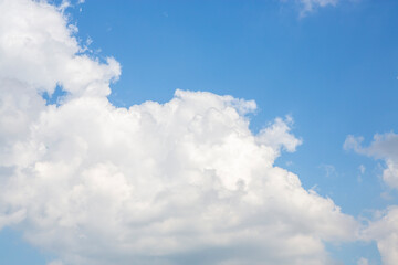 Naklejka na ściany i meble a beautiful view of the white clouds in the sky Beautiful picture of the blue sky with fluffy clouds. High resolution photo editing image source composite graphics JPG files