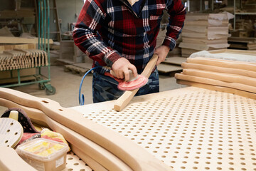 A carpenter works in his workshop.