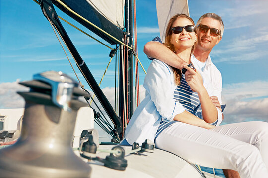 Wealth, Rich And Couple Vacation On A Yacht At Sea As Retirement Investment Feeling Happy, Excited And Enjoying Travel Holiday. Luxury, Romantic And Joyful Baby Boomers On An Anniversary Boat Cruise