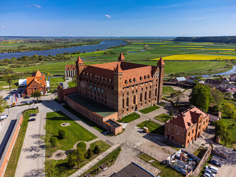 Gniew Castle with a view of fields river and town