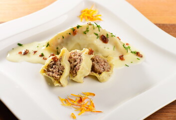 Dumplings stuffed wizh minced meat and mashed potato