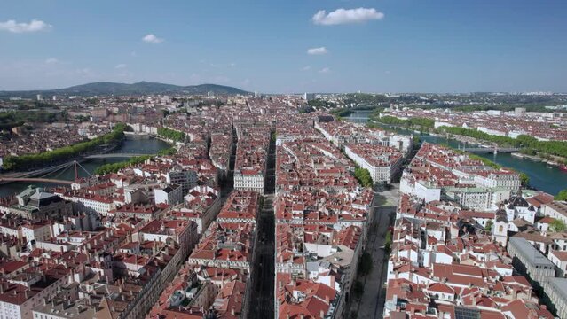 The drone aerial footage of downtown district between River Saone and River Rhone of Lyon, France.