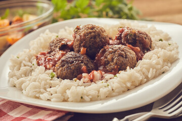 Boiled rice with yummy meatballs