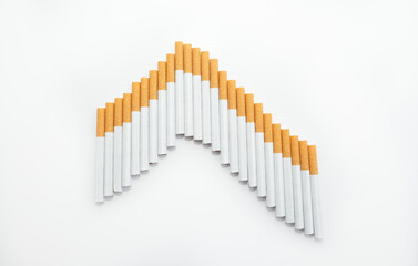 Zigaretten angeordnet wie ein Diagramm über weißem Hintergrund