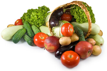 fruits and vegetables lie next to the basket