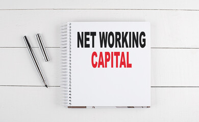 NET WORKING CAPITAL text written on notebook on the wooden background