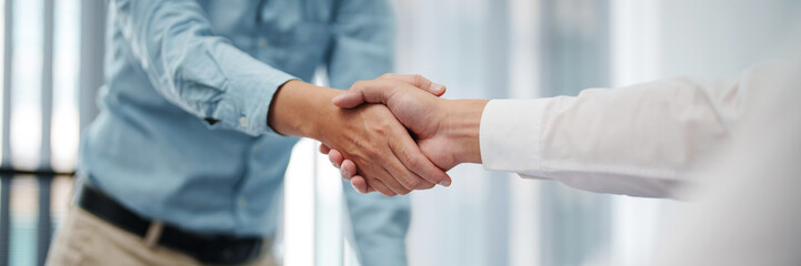 Business man Successful Ideas team shaking hands in Meeting room.