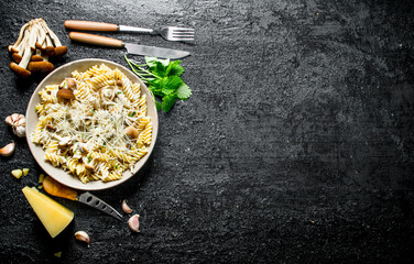 Fusilli pasta with mushrooms,mint leaves and Parmesan.
