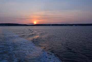 Fototapeta na wymiar Sunset cruising on sea of Okhotsk