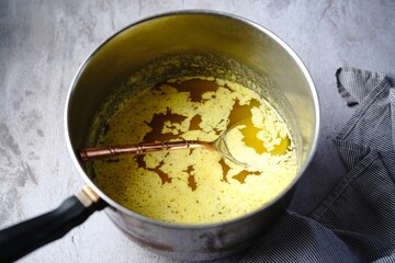 Cooking process of ghee | How to make clarified butter at home, selective focus