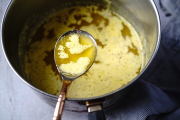 Cooking process of ghee | How to make clarified butter at home, selective focus