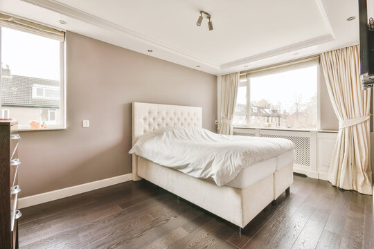 Bedroom interior with high bed