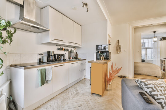 Modern studio apartment with minimalist kitchen