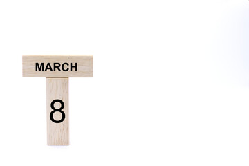 Obraz premium March 8 displayed wooden letter blocks on white background with space for print. Concept for calendar, reminder, date. 
