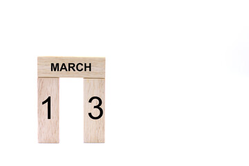 March 13 displayed wooden letter blocks on white background with space for print. Concept for calendar, reminder, date. 