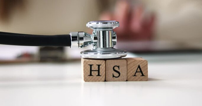 Hsa Health Savings Account Wooden Blocks Near Stethoscope