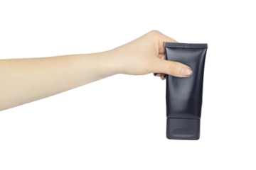 hand with a tube of cosmetics, give a cosmetic product