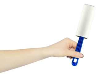 outstretched hand with a sticky roller to remove hair from clothes