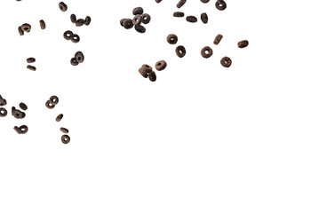 Chocolate rings cereal spill out into a bowl. Breakfast.