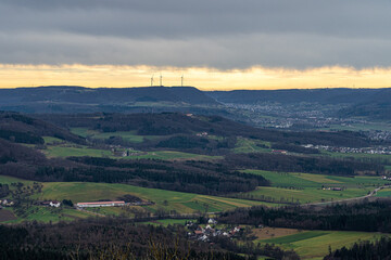 Valleys and hills and forests with wind wheels for renewable energy