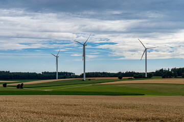 Big windmills for wind power on the field