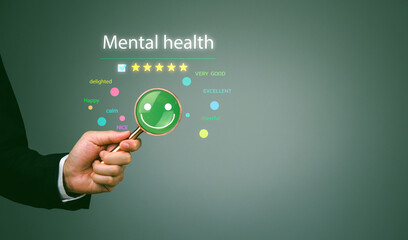 Mental health assessment concept, man holding glasses mockup with survey happy people There will be bright smiley faces, passing a 5-star satisfactory rating.