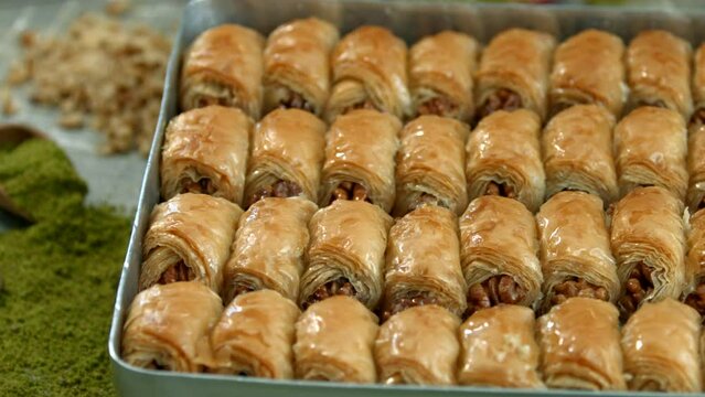 Traditional turkish baklava pistachio pastry. Dilberdudagi, ozel kesim baklava, cikolatali baklava, fistikli baklava, katmer, fistikli kadayif, kattafi, fistik sarma, soguk baklava, midye baklava, cev