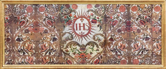 Tuinposter LUZERN, SWITZERLAND - JUNY 24, 2022: The painted baroque side altar with the IHS initials in the Jesuitenkirche from 17. cent. © Renáta Sedmáková
