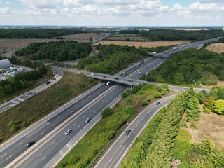 Obraz na płótnie Canvas Hastingwood interchange junction on M11 Harlow Essex UK drone aerial view