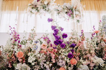 Flowers Decorating Restaurant Hall Photography. Wild Meadow and Aromatic Blooming Plant Decor of Festival Event, Marriage Day or Birthday Anniversary Party. Floristic Seasonal Ornament