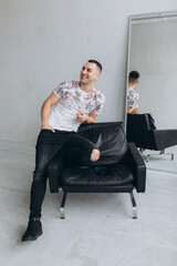 Fashion stylish male portrait. Young handsome man in studio