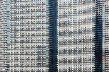 Dense urban living in a row of skyscrapers in Tokyo, Japan