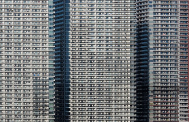 Dense urban living in a row of skyscrapers in Tokyo, Japan