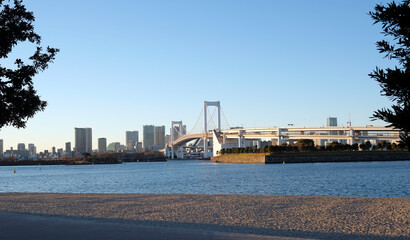 Fototapeta na wymiar Rainbow Bridge going over Tokyo Bay in Tokyo, Japan