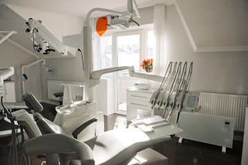 Concept of dental. stomatology concept - interior of new modern dental clinic office with chair.. Dental equipment
