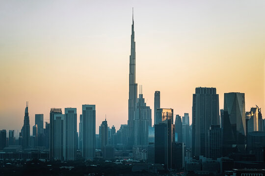 Panorama and aerial view of Dubai in summer day in evening at sunset, United Arab Emirates