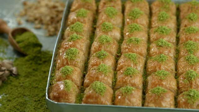 Traditional turkish baklava pistachio pastry. Dilberdudagi, ozel kesim baklava, cikolatali baklava, fistikli baklava, katmer, fistikli kadayif, kattafi, fistik sarma, soguk baklava, midye baklava, cev