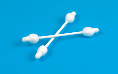 ear sticks on blue background