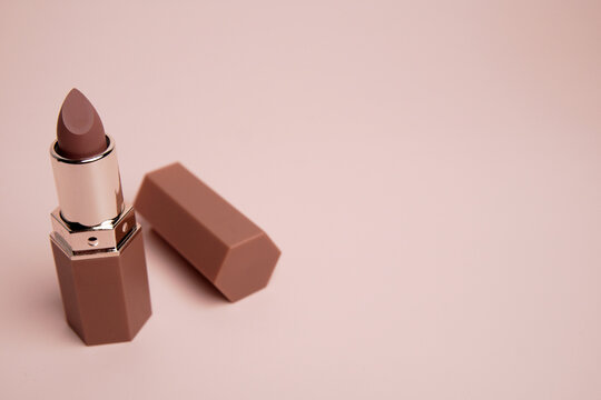 open lipstick in a case with copy space