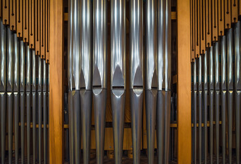 Close-up of the pipes of a small church organ