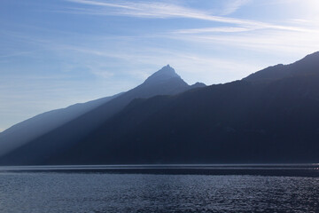 Water panoramic view of lake Bourget with Dent du Chat mont peak Auvergne-Rhône-Alpes region...