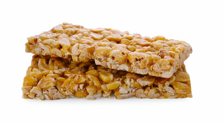 Tasty peanut bars (kozinaki) isolated on white