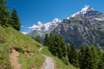 Fototapeta na wymiar The Bernese alps with the Jungfrau, Monch and Eiger peaks.